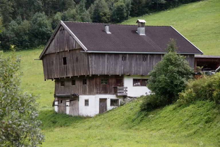 Old wooden barn on a farm property ready for barn demolition