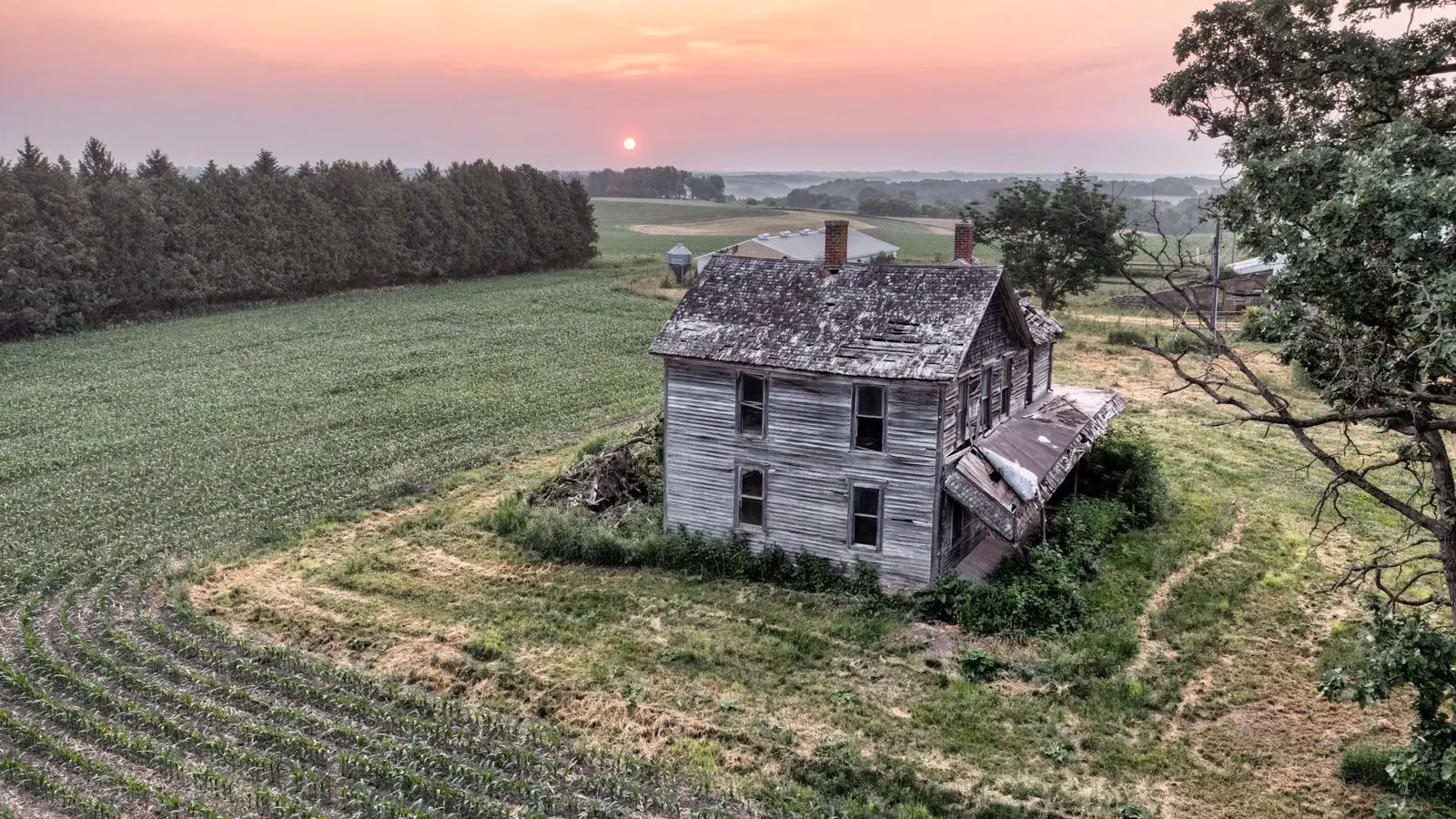 Aerial view of an abandoned farmhouse on rural acreage, demolition contractor in Elderton, PA